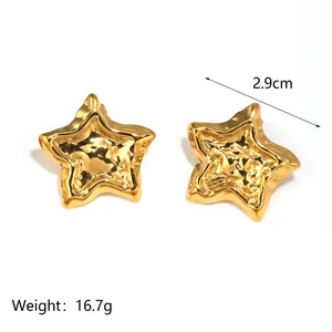 Detailed size view of gold star hoop earrings with hammered metal texture measuring 2.9cm