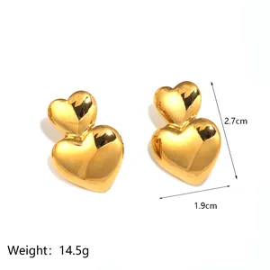 Detailed view of 18K gold plated double heart earrings with size and weight specs