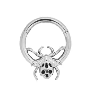 Detailed silver spider septum ring featuring a skull-shaped hollow gothic design on a hoop