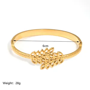 18K gold plated stainless steel floral bangle with hammered texture and 6cm diameter