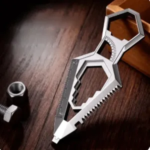 Multi-functional EDC stainless steel sword tool with wrench and ruler on wood desk