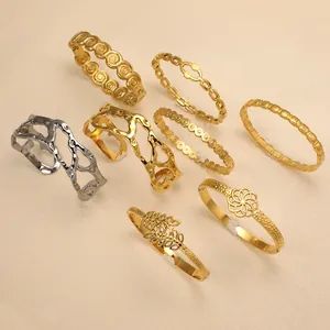 Collection of 18K gold plated stainless steel floral and spiral textured bangles