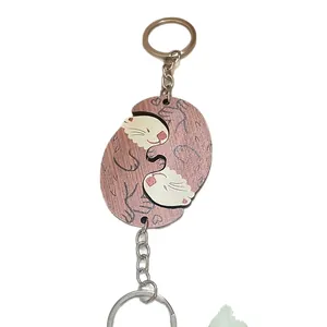 Creatieve houten sleutelhanger set voor koppels met in elkaar grijpende knuffelende otters