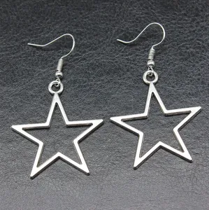Silver hollow star dangle earrings with minimalist geometric design on dark textured surface