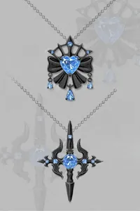 Gothic necklace pendants with blue crystals and black enamel cross and heart designs