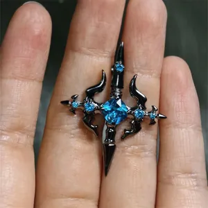 Gothic cross star earring with light blue crystal and gun black metal finish