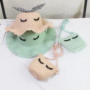 Set cappello di paglia e borsa a tracolla per bambina con ricamo a ciglia