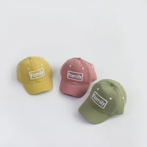 Kids cotton baseball caps with Family embroidery in yellow, pink and green colors