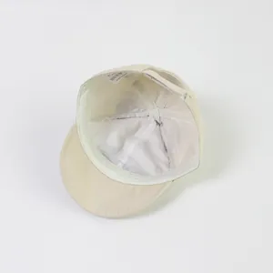 Detail view of cotton baseball cap interior with sweatband and adjustable velcro strap