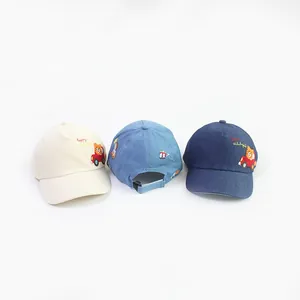 Detailed embroidery of cartoon bear driving car with happy driving text on kids caps