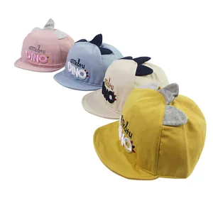 Cute dinosaur themed baby baseball caps set in pink, blue, beige, and yellow colors