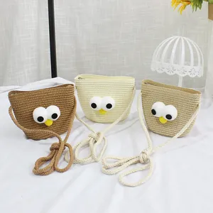 Stroh-Umhängetaschen für Kinder mit großen Augen in Creme, Beige und Brauntönen