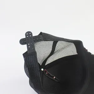Detail of black breathable mesh baseball cap with red sequins and adjustable snapback closure
