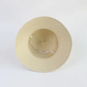 Kids woven straw sun hat with wide brim and adjustable chin strap for beach use