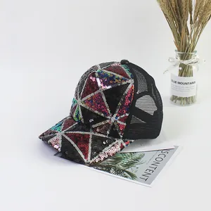 Detail of colorful geometric sequins on a breathable mesh trucker baseball cap