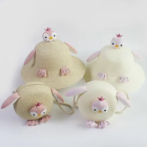 Conjunto de sombrero de paja y bolso de pingüino para niños, protección solar para la playa