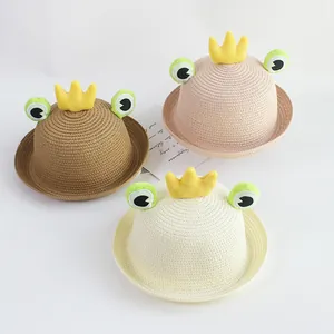 Kids woven straw sun hats featuring frog eyes and crown in brown, pink, and beige