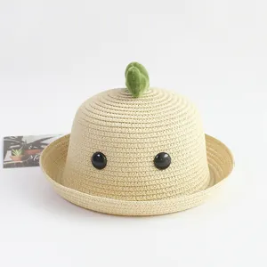 Sombrero de sol para niños en paja beige con cara de dinosaurio y adorno verde