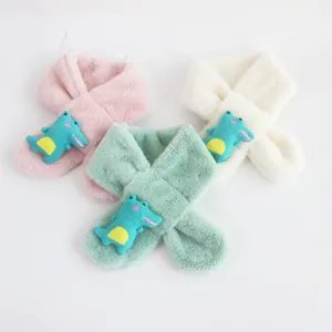 Detailed plush texture of children's faux fur scarves with cute cartoon crocodile patches