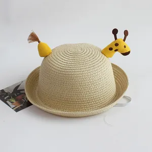 Kids beige straw hat with cute giraffe decoration and windproof strap for summer beach