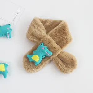 Detail of plush brown dinosaur scarf for kids with soft faux fur texture and green crocodile