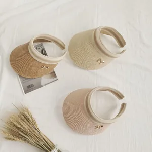 Visiere parasole in paglia da donna con fiocco dorato in vari colori eleganti