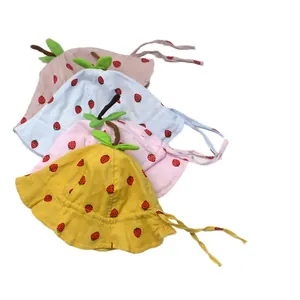 Cute strawberry baby sun hats in four colors with wide brims and secure chin straps