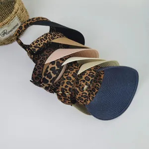 Foldable straw sun visors with leopard print and solid colors for beach vacation