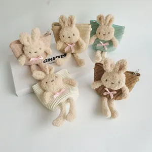 Detailed set of five mini straw crossbody bags for girls in pastel colors with bunny decor