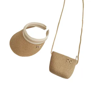 Set estivo cappello di paglia e borsa a tracolla coordinata con dettaglio fiocco in metallo