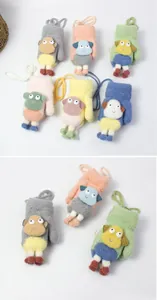 Detail view of colorful plush fleece mittens with cute 3D cartoon sheep and neck strings