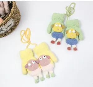 Detail of plush lamb mittens for kids with soft fleece lining and neck string