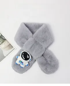 Detailed close-up of grey plush neck warmer with 3D astronaut patch for kids