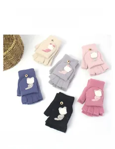 Flat lay of knit convertible flip top mittens in six colors with cartoon cat details