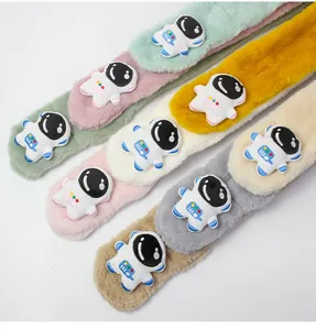 Detail view of plush astronaut scarves in multiple colors with soft faux rabbit fur texture