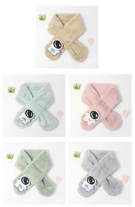 Close-up of soft plush kids scarf with astronaut patch in various pastel colors
