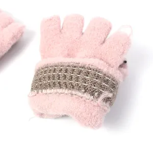Pink knitted fingerless gloves for women with flip-top design and brown wrist cuffs