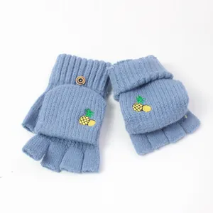 Blue knitted convertible fingerless gloves with a pineapple embroidery pattern