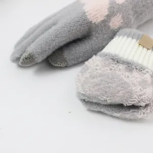 Winter knitted touchscreen gloves for women featuring a cute grey and pink cat paw design