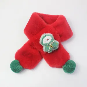 Detail of red plush Christmas scarf for kids with snowman doll and green pom-poms