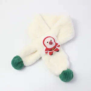 Detail of soft plush Christmas scarf for kids featuring a cute Santa Claus patch and green pompoms