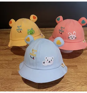 Tre cappelli a secchiello per bambini giallo rosa e blu con orecchie 3D e ricami
