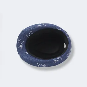 Navy blue straw fedora for kids with white palm tree prints and breathable lining