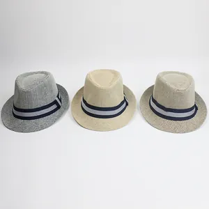 Detailed weave texture of paper straw fedora hats in grey-blue, beige and khaki colors