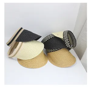 Detail view showing varied woven textures and patterned headbands of summer sun visors