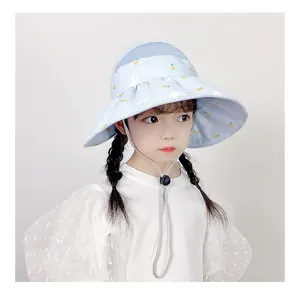 Detail of girls sun hat featuring floral rabbit print with breathable mesh and chin strap