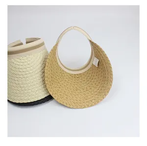 Close-up of woven paper straw texture and internal label of sun visor hat