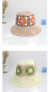 Close-up of handmade crochet sunflower patterns and woven texture on summer bucket hats