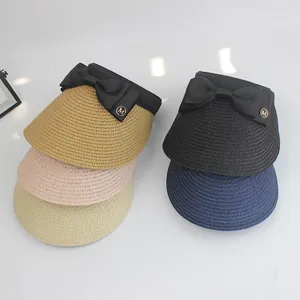 Straw sun visors with bows in khaki, pink, beige, black, and navy for women