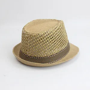 Detail of breathable hollow mesh weave and striped band on a men's straw fedora sun hat